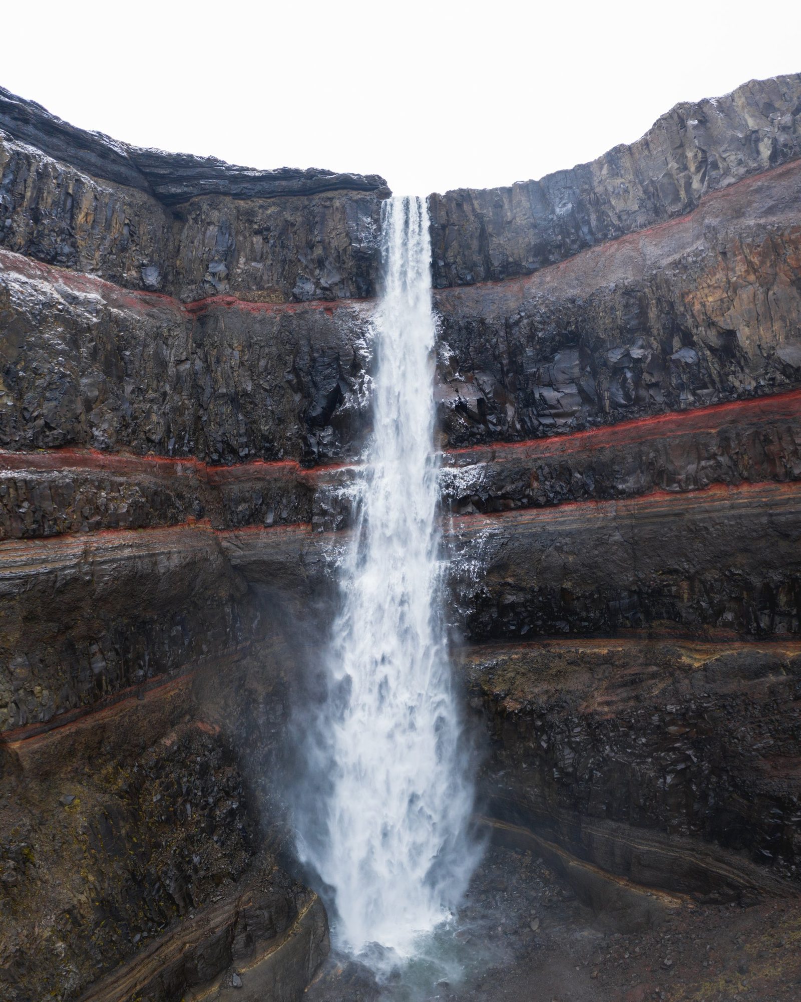 Hengifoss waterfall in East Iceland, a popular day hike, under soft light
